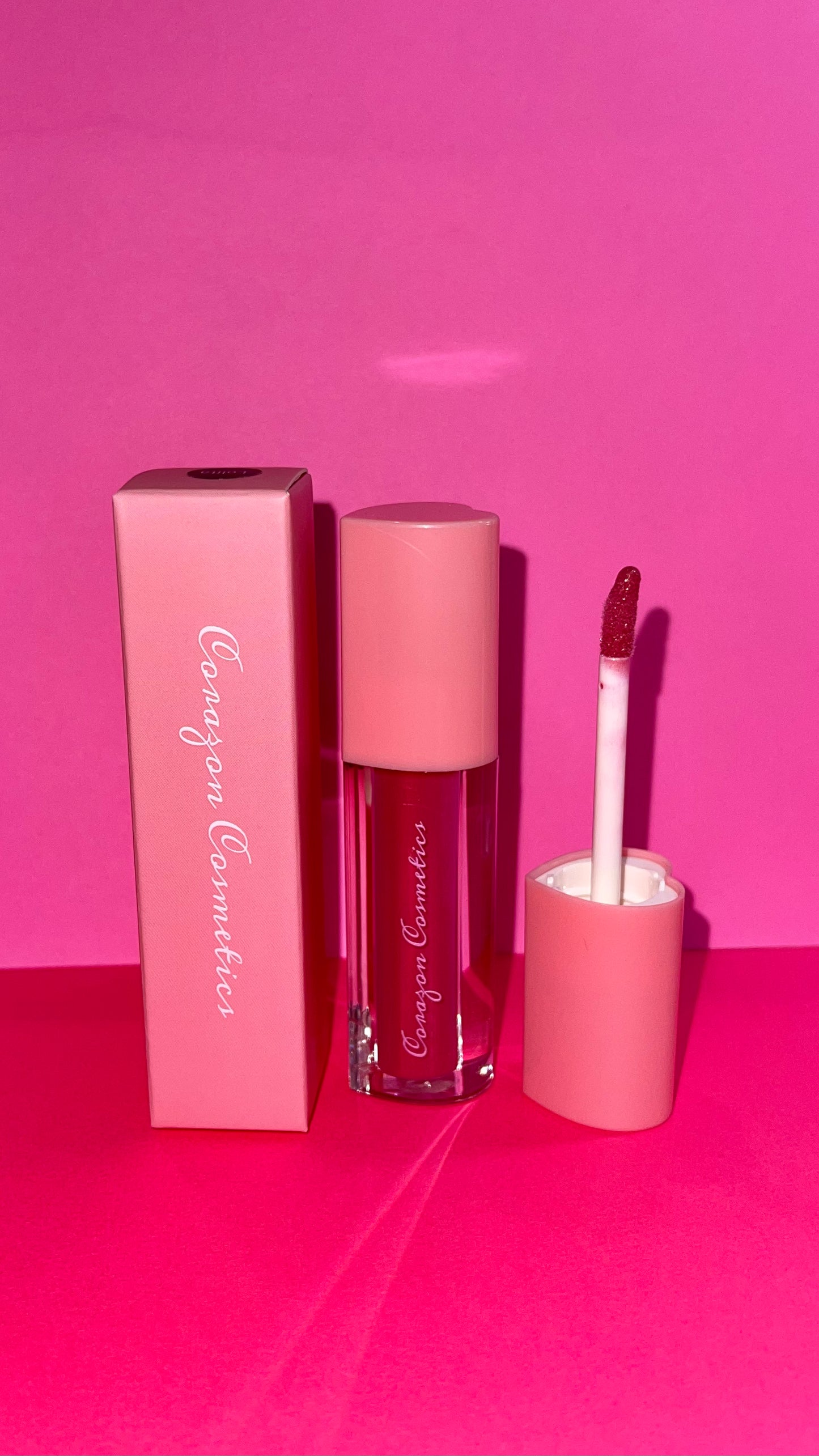 Super beautiful and pretty heart shaped lipgloss from Corazon Cosmetics Latina Owned business, Lipgloss formulated with vitamins for a smooth soft and shiny color, the most hydrating lipgloss instantly nourishes lips. CorazonCosmetics.Net